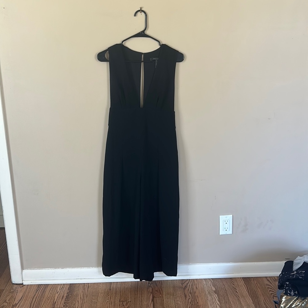 BCBG Maxazria black jumpsuit, size S